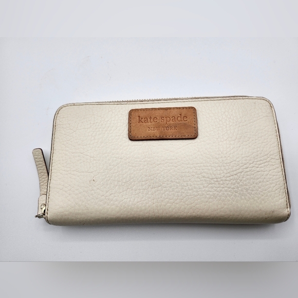 kate spade Handbags - Kate Spade Cream and Tan Leather Accessory